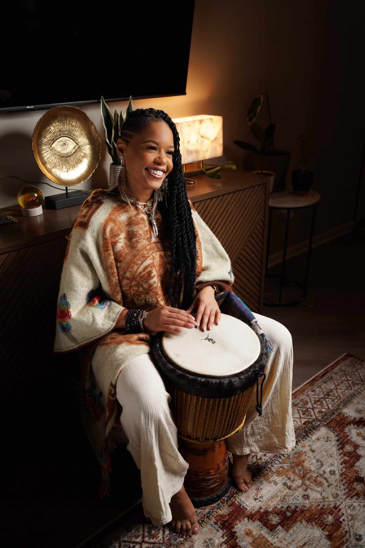 Shaman Yawna Shakti facilitating a large group sound healing session in Chicago