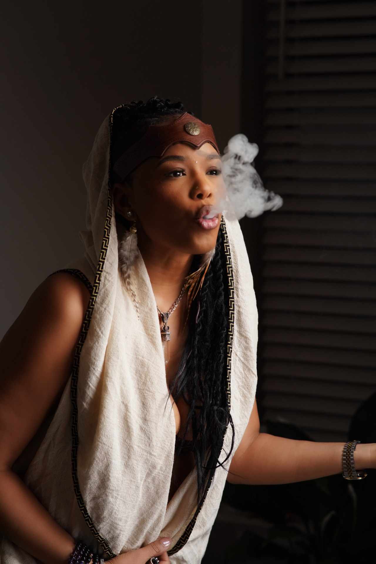 Shaman Yawna Shakti in ceremony, clearing the space with sacred smoke before an Alkhemiyah experience